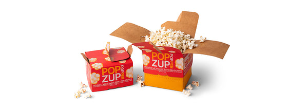 Two Popzup Popper's, one with the popcorn popped inside